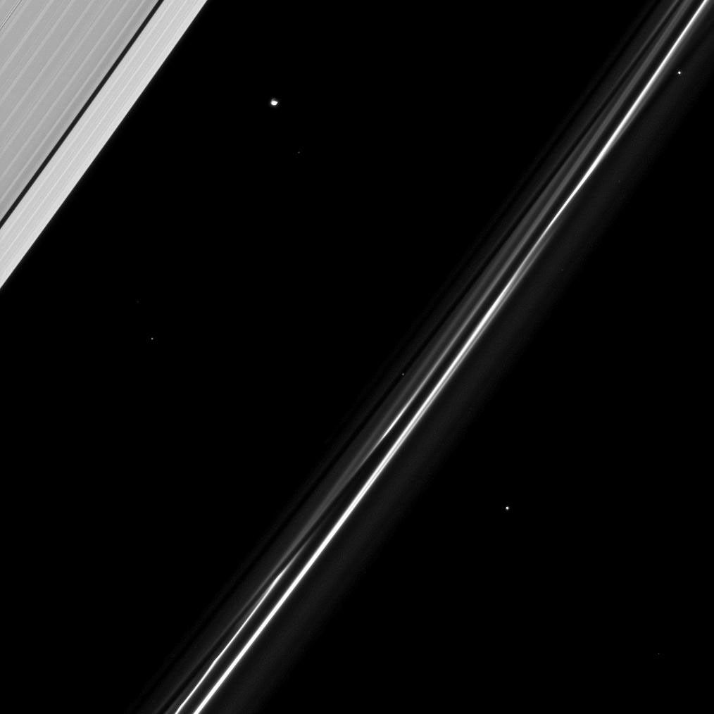 Atlas is seen in this image taken on March 23, 2009 by NASA's Cassini spacecraft with several background stars as the moon orbits within the Roche Division, the region between Saturn's A and F rings.