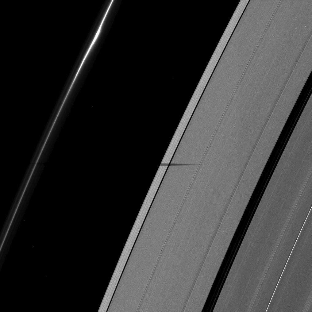The shadow of the moon Epimetheus is cast onto Saturn's rings, striking the outer-most part of the A ring and only just nipping the F ring. This image is from NASA's Cassini spacecraft.