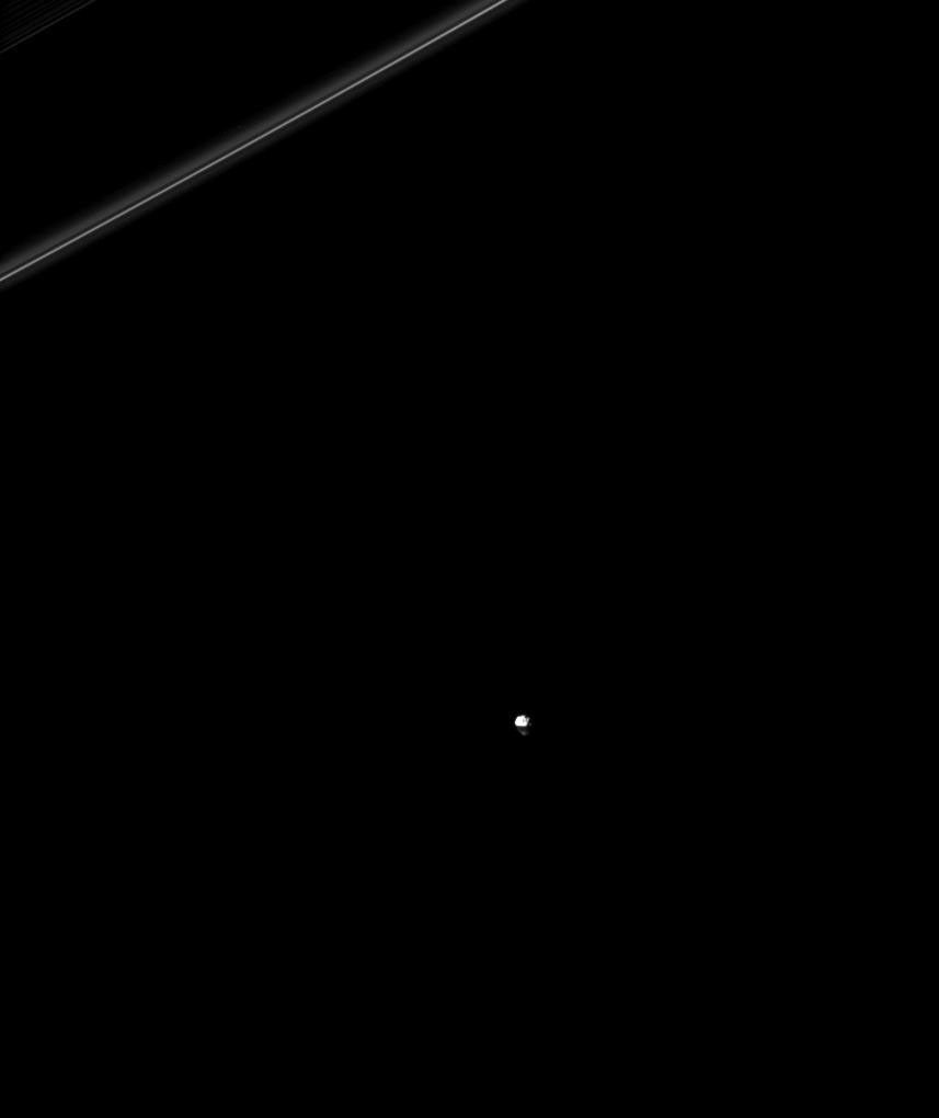 Saturn's rings cast a shadow on the moon Janus in this image from NASA's Cassini spacecraft made possible only around the time of the planet's August 2009 equinox.