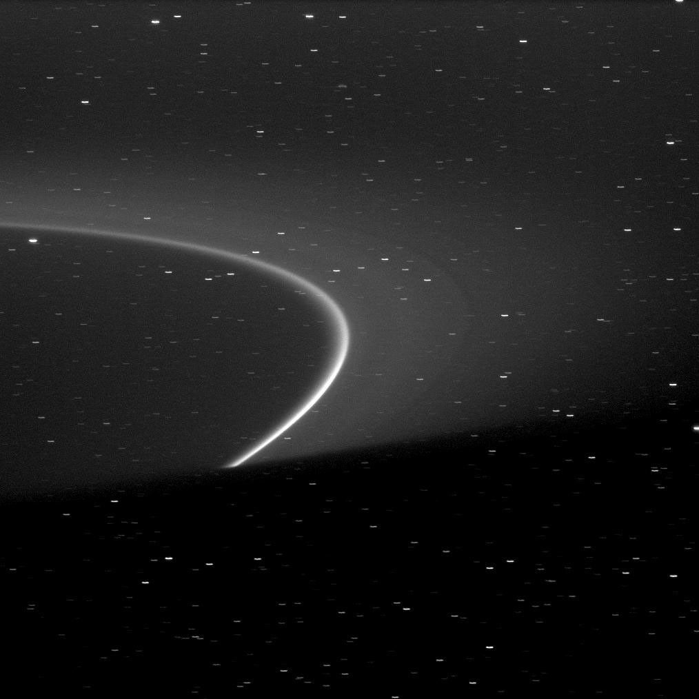 The bright arc within Saturn's G ring is shown truncated by the shadow of the planet at the bottom of this image captured by NASA's Cassini spacecraft.
