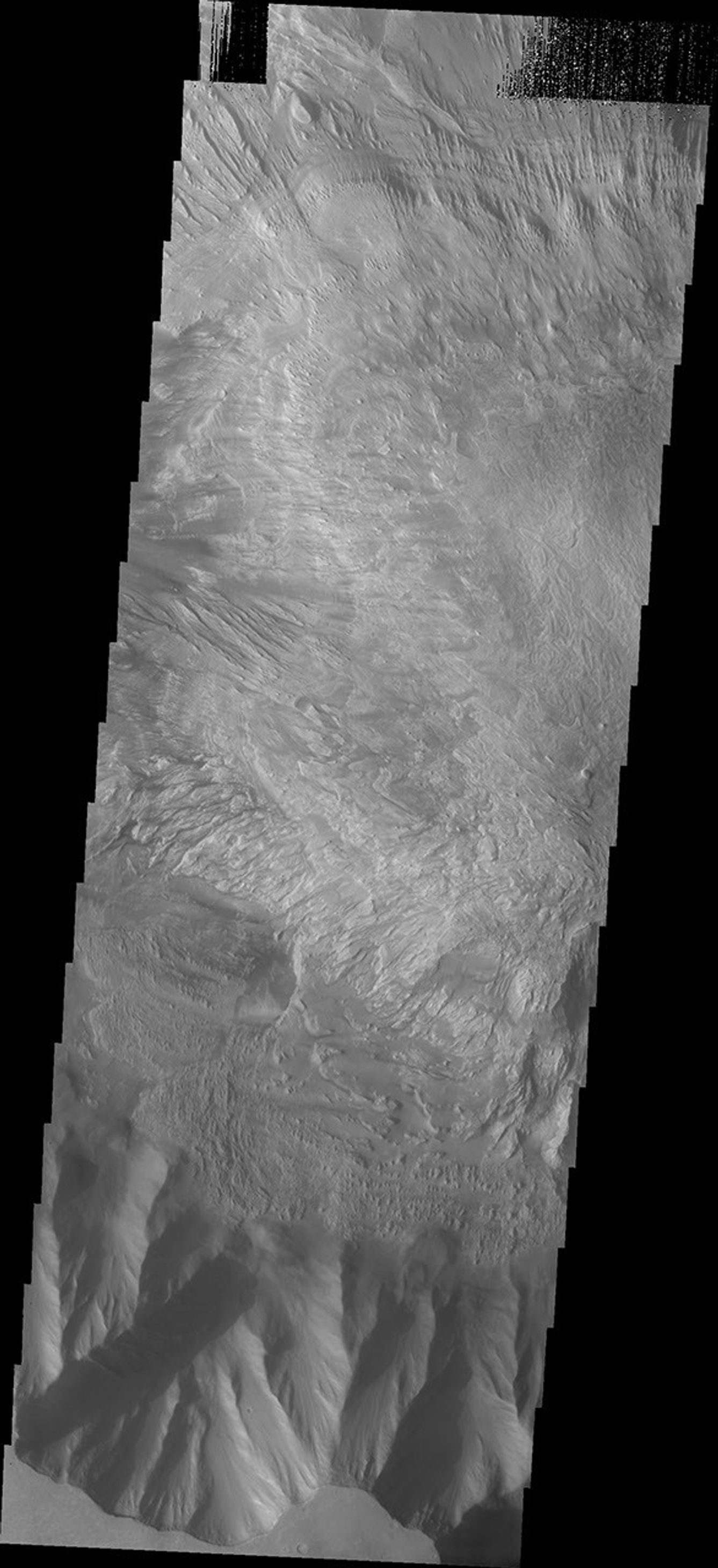 This image from NASA's Mars Odyssey shows a small portion of the floor and floor deposits within Hebes Chasma.