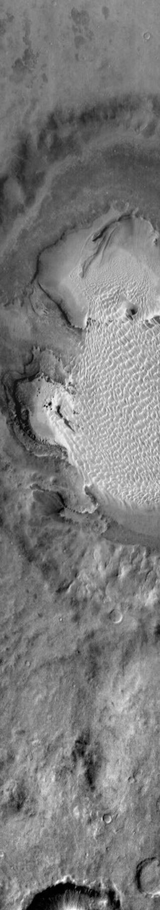 This image of Rabe Crater on Mars illustrates the warming effect of the sun on sand as seen by NASA's Mars Odyssey spacecraft.