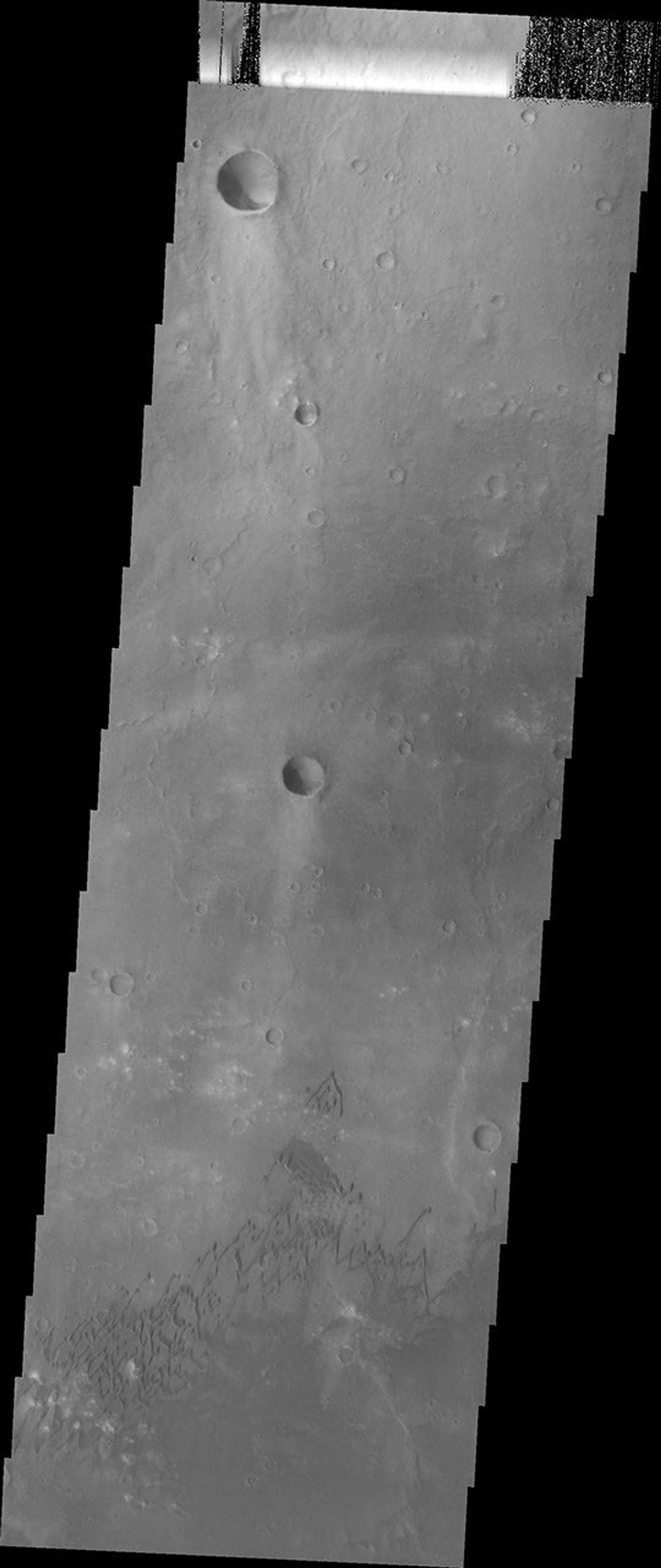 The sand dunes in this image are located on the floor of Herschel Crater on Mars as seen by NASA's Mars Odyssey spacecraft.