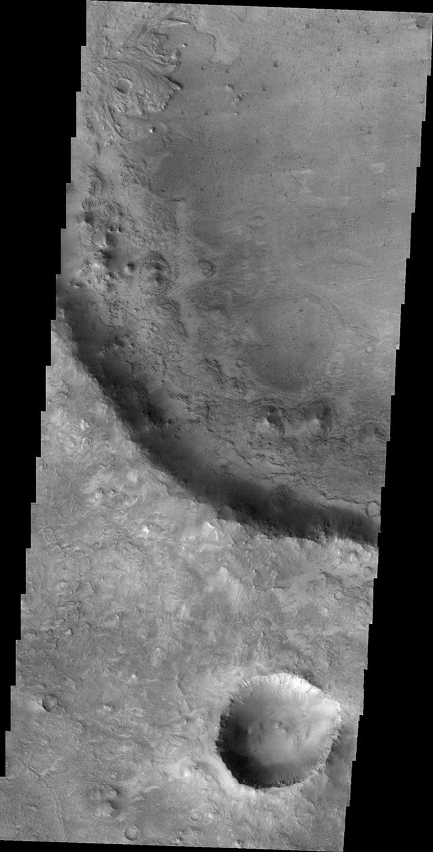 A small delta is located in this unnamed crater near Nili Fossae on Mars as seen by NASA's Mars Odyssey spacecraft.
