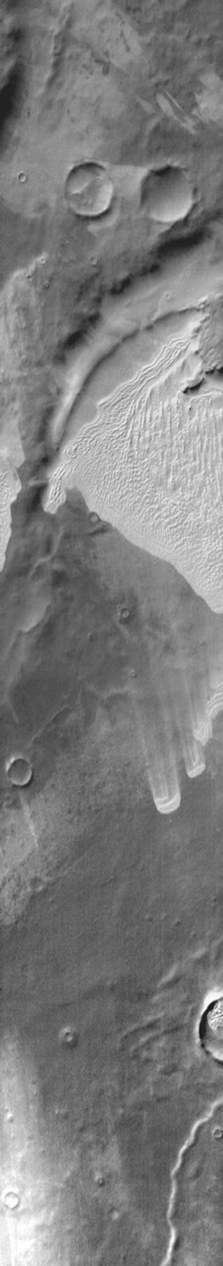 This 2001 Mars Odyssey image shows an extensive sand sheet near Mar's south polar cap.