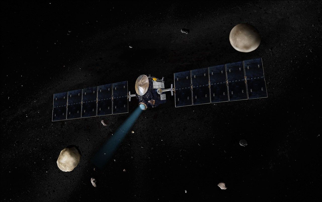 Artist's concept of the Dawn spacecraft with Vesta and Ceres.