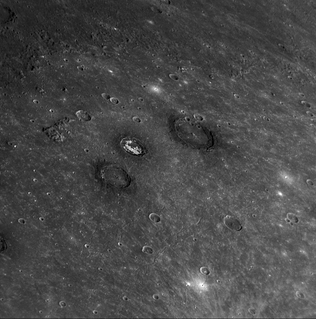 Sander, Munch, and Poe are a trio of impact craters within the Caloris impact basin. Munch and Poe were recently named, while Sander received its name in the first set of feature names after MESSENGER's first Mercury flyby.