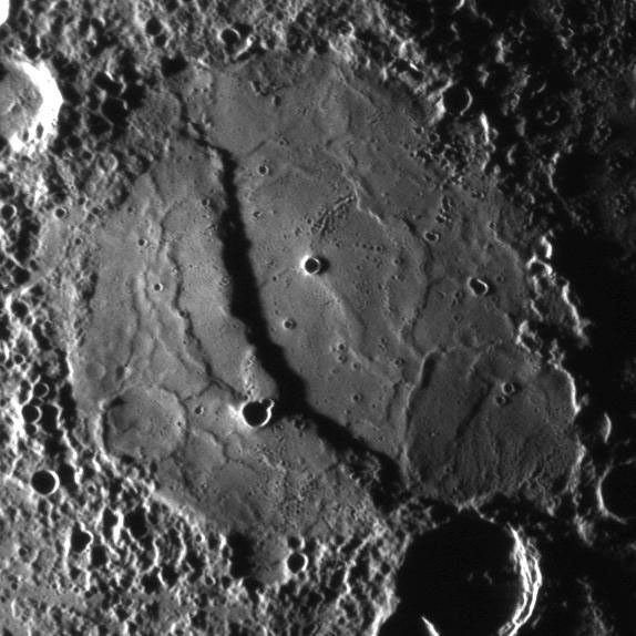 The scarp cutting through this crater was imaged as NASA's MESSENGER approached the planet during the mission's second Mercury flyby.