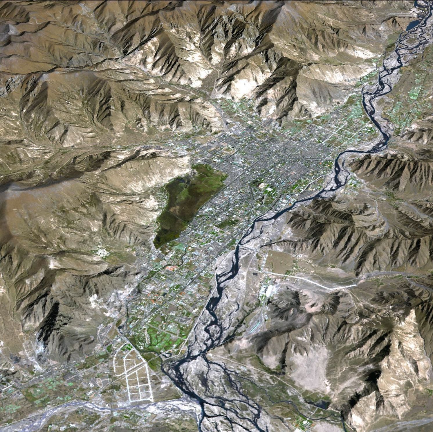 JPL's Advanced Spaceborne Thermal Emission and Reflection Radiometer aboard NASA's Terra satellite, shows Lhasa, the traditional seat of the Dalai Lama and capital of the Tibet Autonomous Region in China.