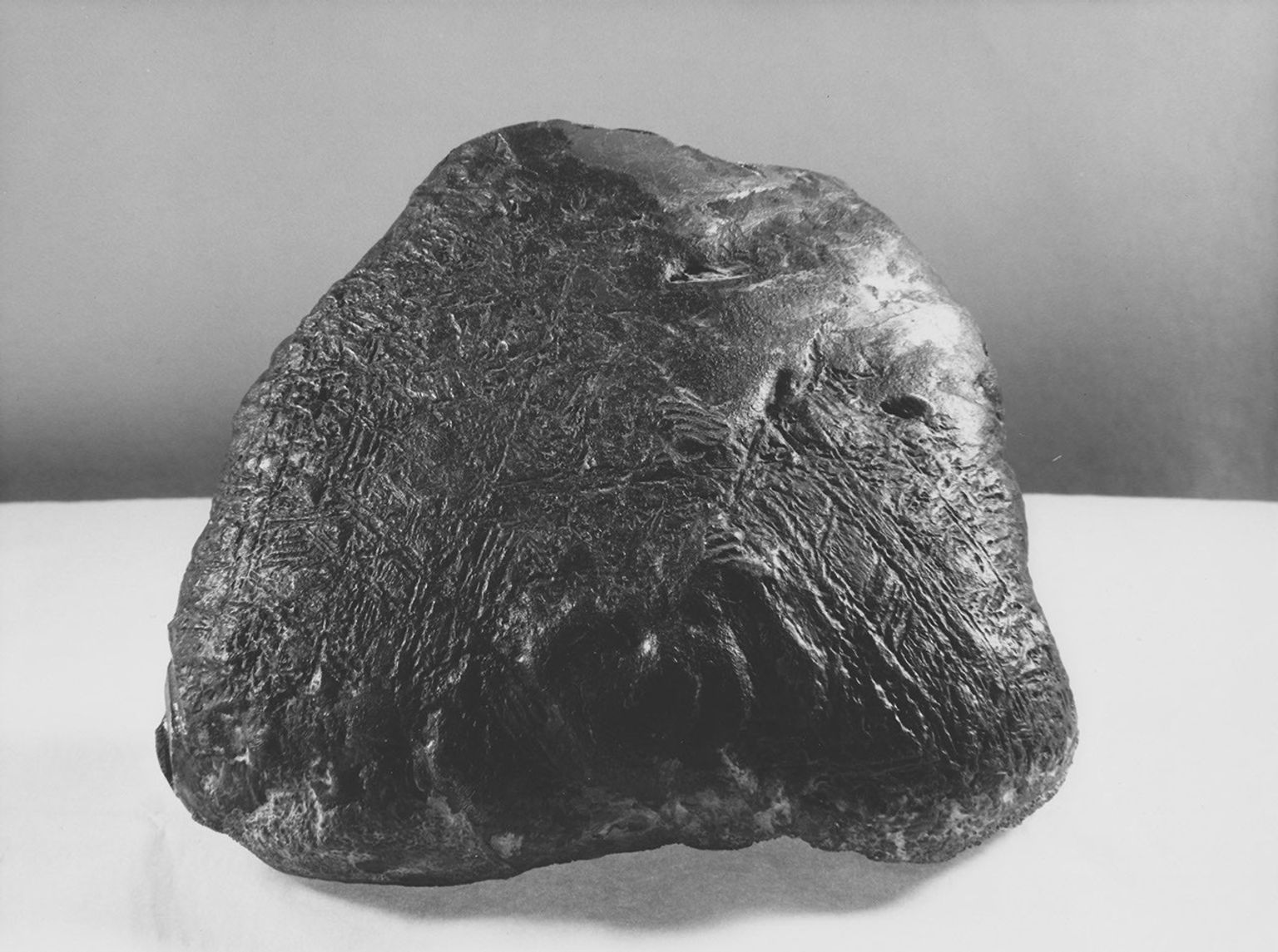 This iron-nickel meteorite found near Fort Stockton, Texas, in 1952 shows a surface texture similar to some portions of the surface of an iron-nickel meteorite that NASA's Mars Exploration Rover Opportunity found on Mars in July, 2009.