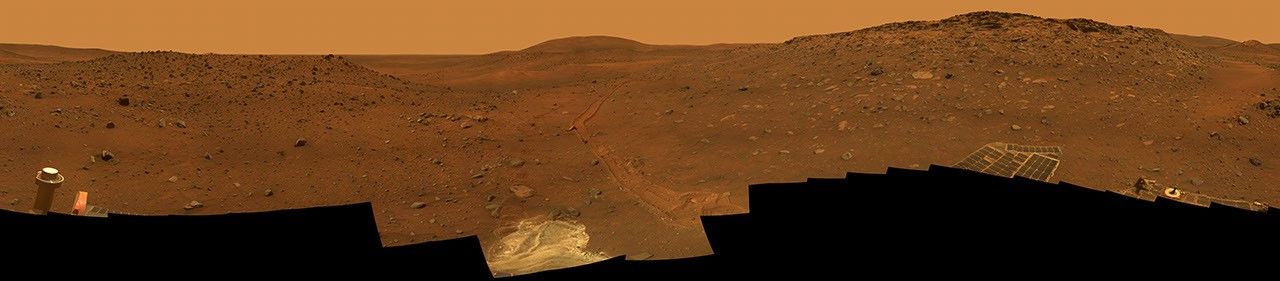 This full-circle,stereo view from the panoramic camera (Pancam) on NASA's Mars Exploration Rover Spirit shows the terrain surrounding the location called 'Troy,' where Spirit became embedded in soft soil during the spring of 2009.