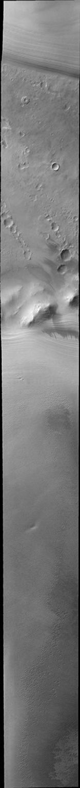 This image from NASA's Mars Odyssey shows multiple layers at the end of Mars' polar cap as summer ends at the south pole.