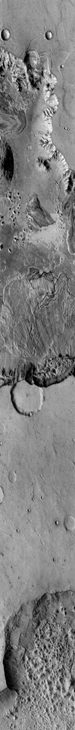 This image from NASA's Mars Odyssey shows a large landslide deposit in Ganges Chasma on Mars.