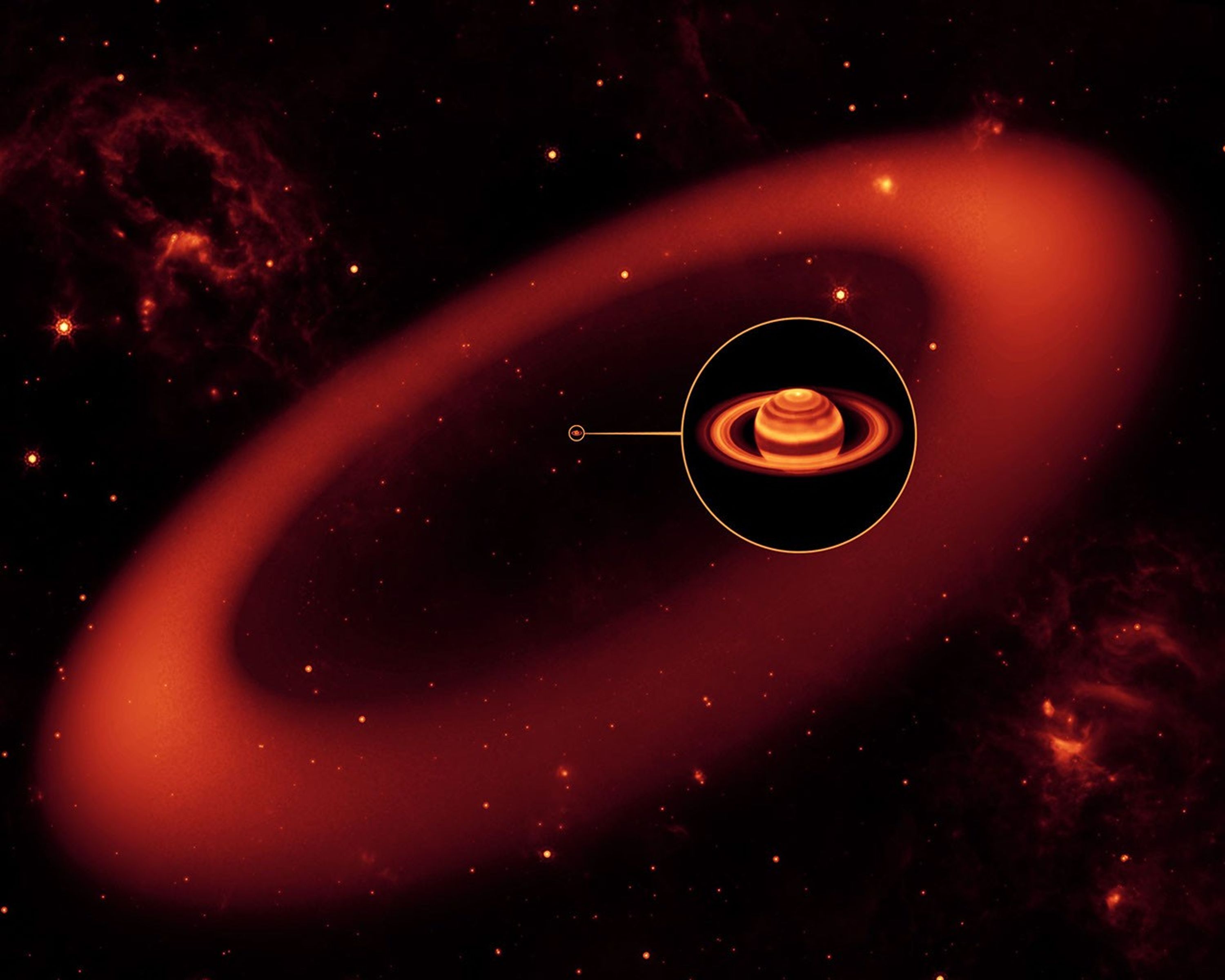 This artist's conception shows a nearly invisible ring around Saturn -- the largest of the giant planet's many rings. It was discovered by NASA's Spitzer Space Telescope.