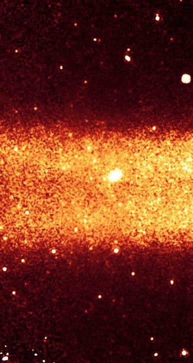 This picture highlights a slice of Saturn's largest ring. The ring (red band) was discovered by NASA's Spitzer Space Telescope, which detected infrared light, or heat, from the dusty ring material.