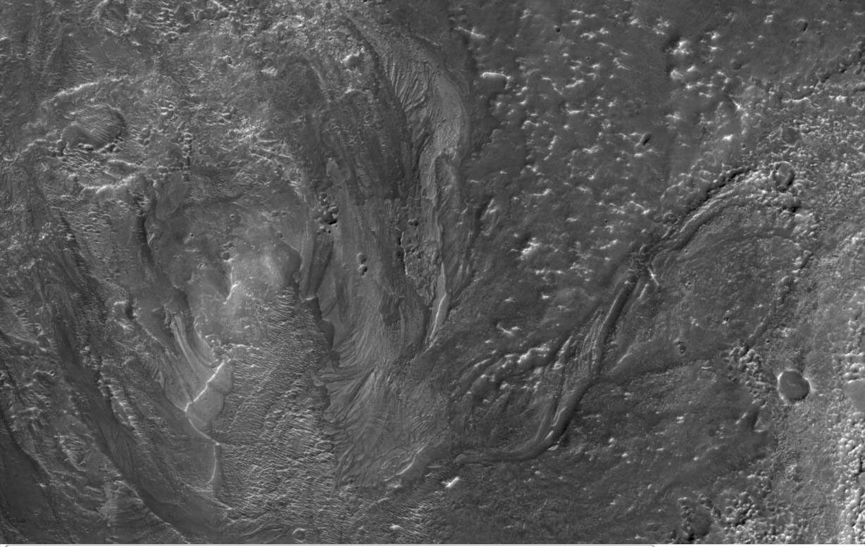 This image from NASA's Mars Reconnaissance Orbiter, shows channels to the southeast of Hale crater on southern Mars. Channels associated with impact craters were once thought to be quite rare.