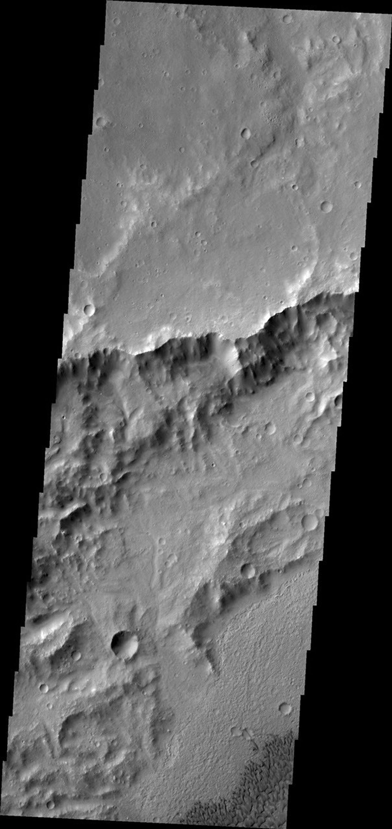 NASA's 2001 Mars Odyssey spacecraft captured this image of dunes on the floor of an unnamed crater in Tyrrhena Terra.