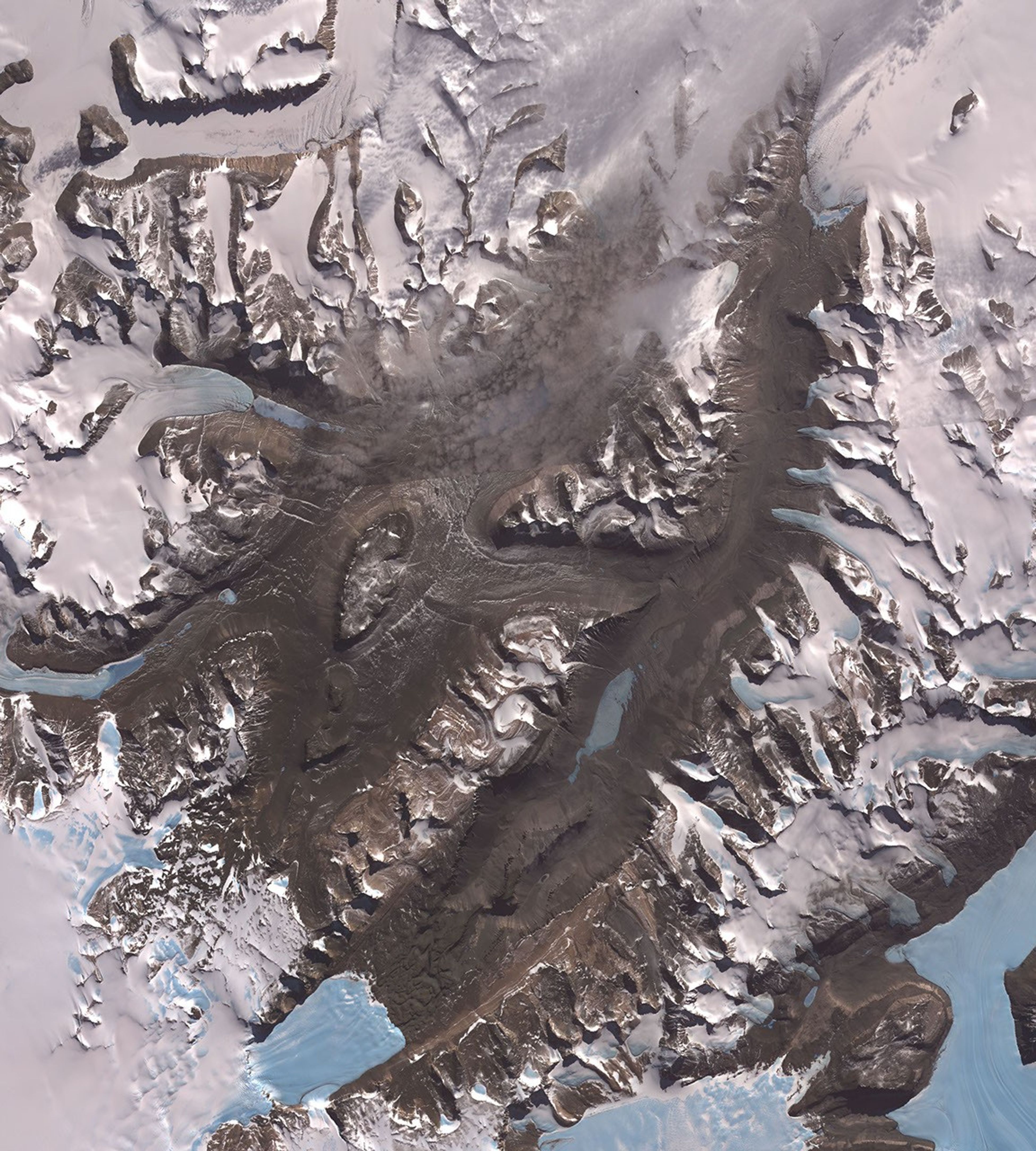 The McMurdo Dry Valleys are a row of valleys west of McMurdo Sound, Antarctica. They are so named because of their extremely low humidity and lack of snow and ice cover. This image was acquired December 8, 2002 by NASA's Terra spacecraft.