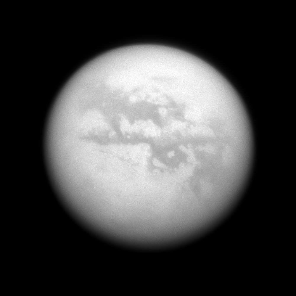 NASA's Cassini spacecraft gazes at several albedo features on Saturn's largest moon, Titan. Left to right are four dark regions: Fensal, Aztlan, Aaru and a part of Senkyo.