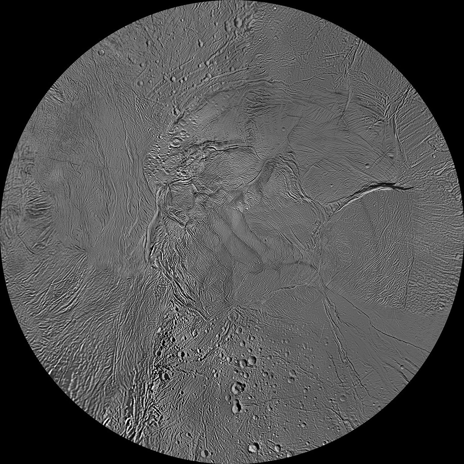 The northern and southern hemispheres of Saturn's moon Enceladus are seen in these polar stereographic maps, mosaicked from the best-available NASA Cassini and Voyager clear-filter images.