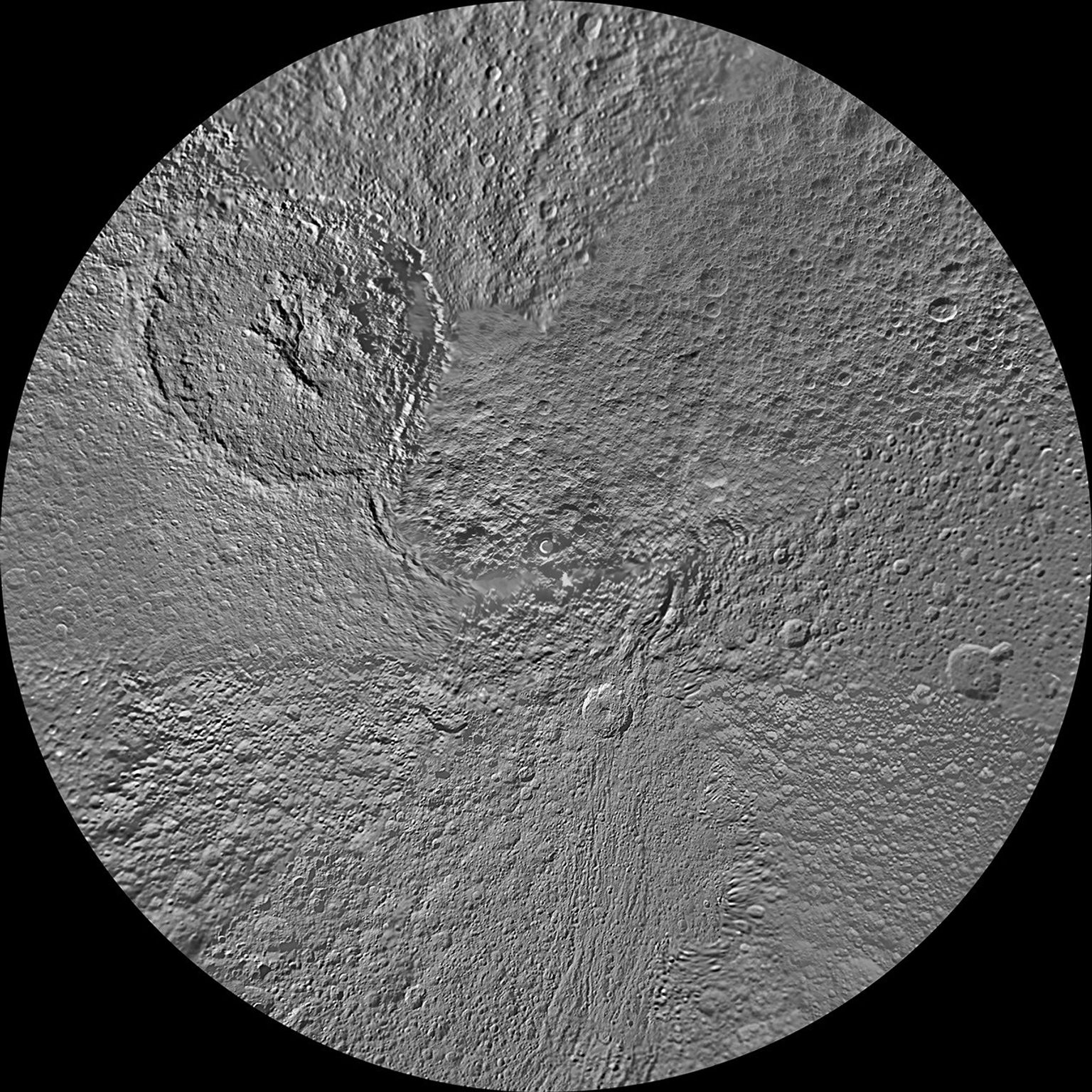 The northern hemisphere of Saturn's moon Tethys is seen in this updated polar stereographic map, mosaicked from the best-available images obtained by NASA's Cassini spacecraft.