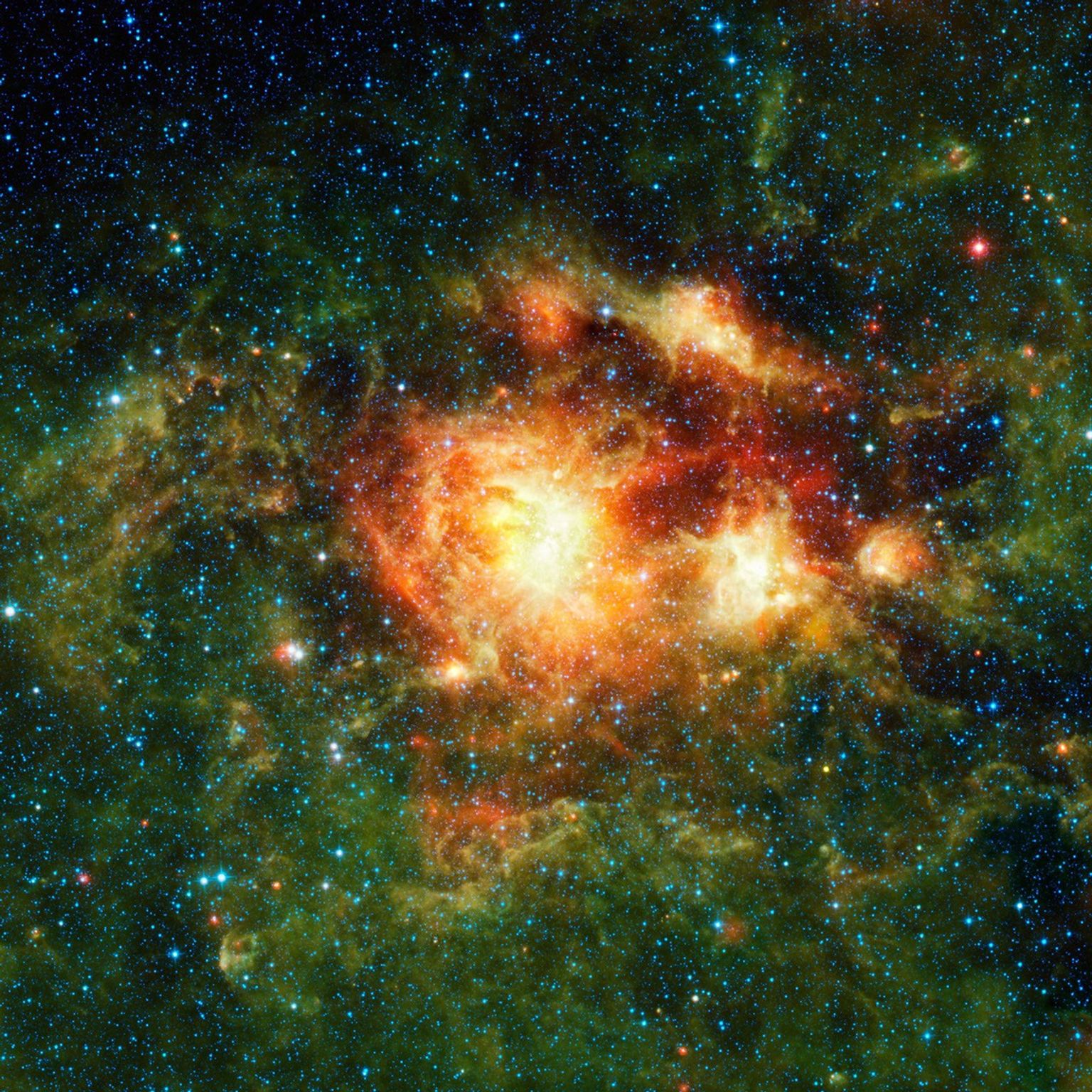 This infrared image taken by NASA's Wide-field Infrared Survey Explorer shows a star-forming cloud teeming with gas, dust and massive newborn stars.
