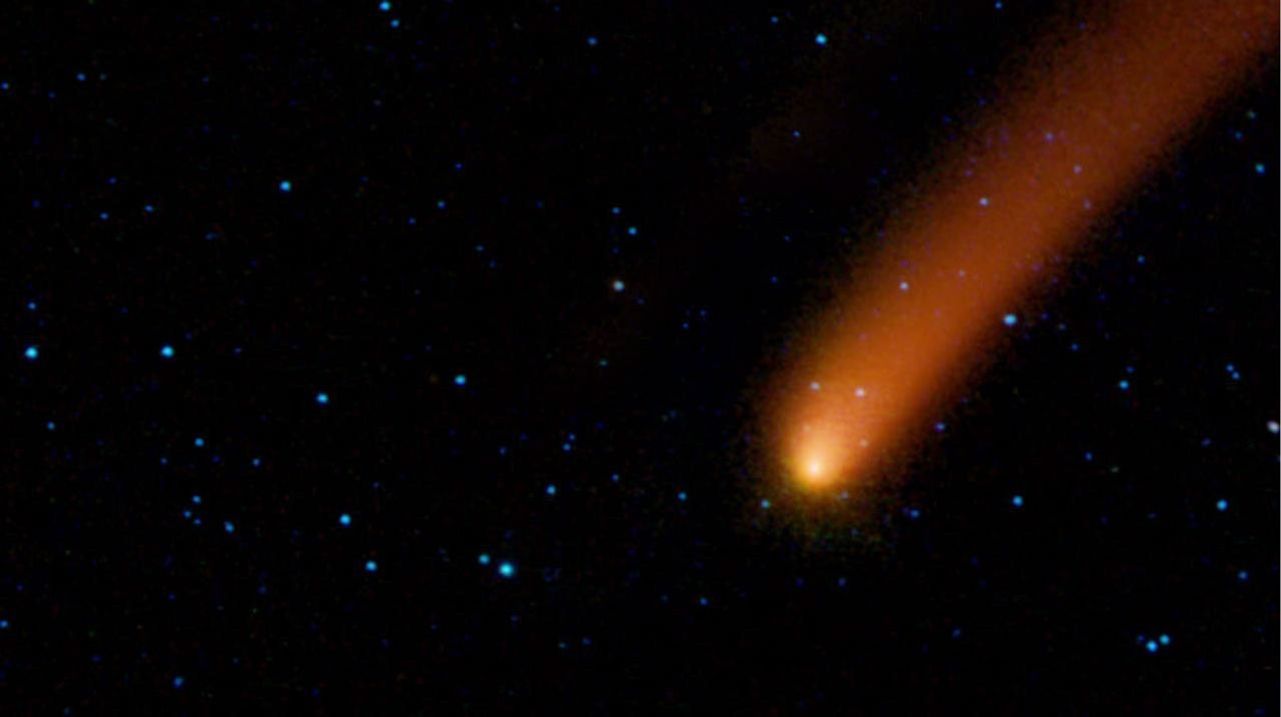 Is it a bird, or a plane? No, it's comet Siding Spring streaking across the sky, as seen by NASA's Wide-field Infrared Survey Explorer, or WISE. An animation is available at the Photojournal.