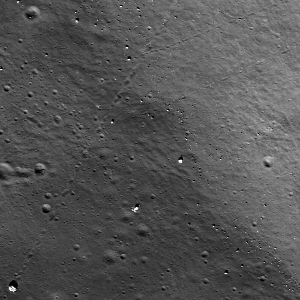 NASA's Lunar Reconnaissance Orbiter spies many boulder trails are found on the lunar crater walls and basin massifs. Some of the trails are smooth and nearly straight while others are curvy or gouge into the surface.