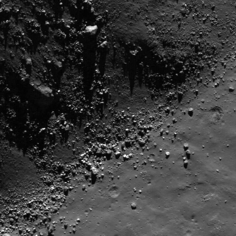 This image from NASA's Lunar Reconnaissance Orbiter shows a view of boulders, on the floor of Rutherfurd crater, about to disappear into the shadows of dusk.