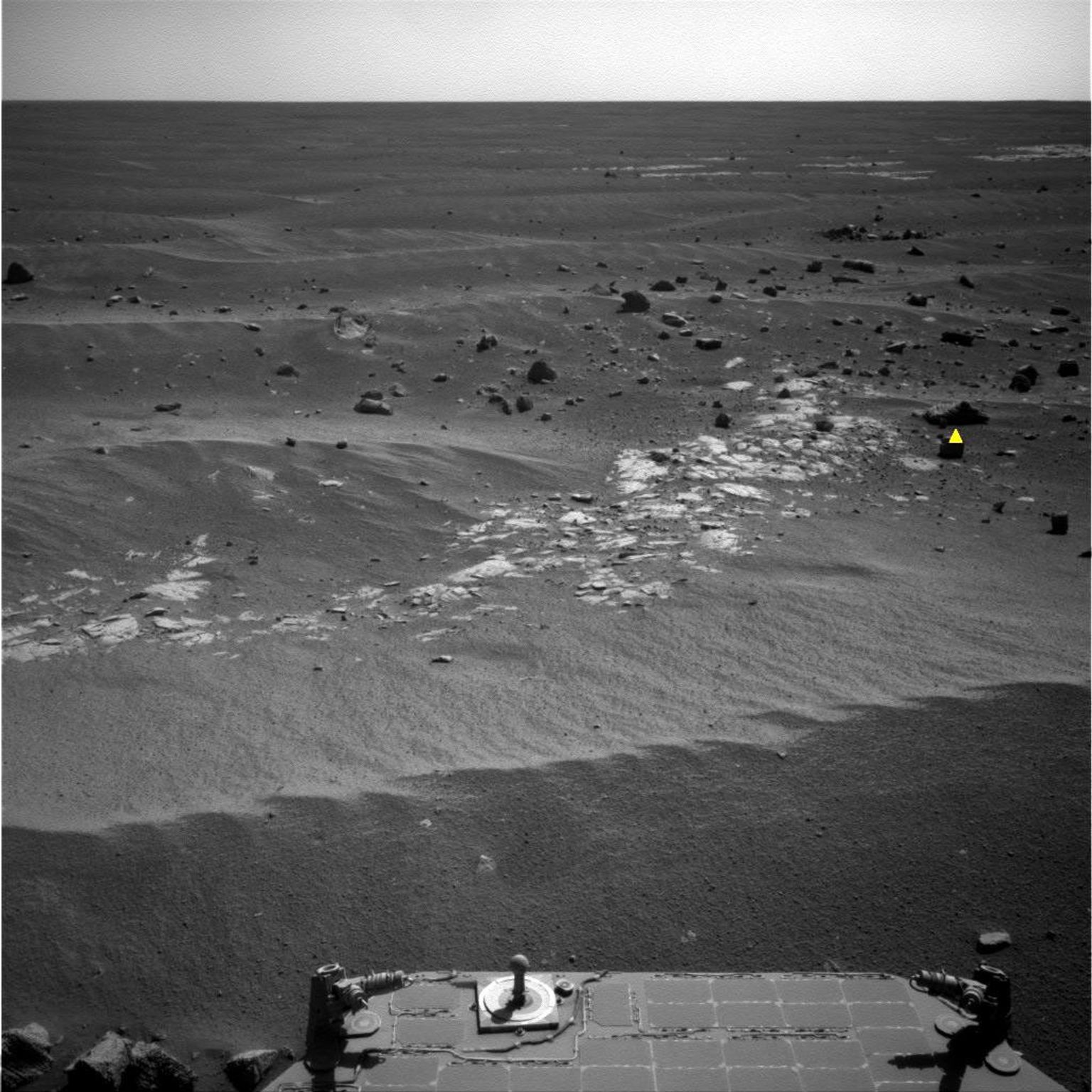 NASA's Opportunity used newly developed and uploaded software called AEGIS, to analyze images to identify features that best matched criteria for selecting an observation target; the criteria in this image -- rocks that are larger and darker than others.