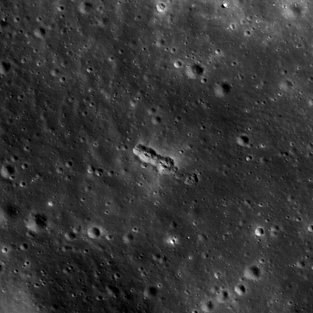 This image taken by NASA's Lunar Reconnaissance Orbiter shows a small secondary crater chain near the southwestern margin of Mare Orientale, within the Inner Rook Mountains. The ~125-meter-long chain lies within the Orientale multi-ring basin.