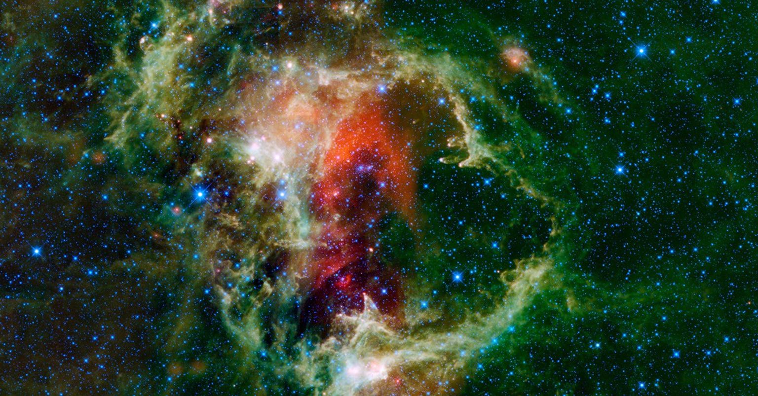 This mosaic from NASA's WISE Telescope is of the Soul Nebula. It is an open cluster of stars surrounded by a cloud of dust and gas located about 6,500 light-years from Earth in the constellation Cassiopeia, near the Heart Nebula.