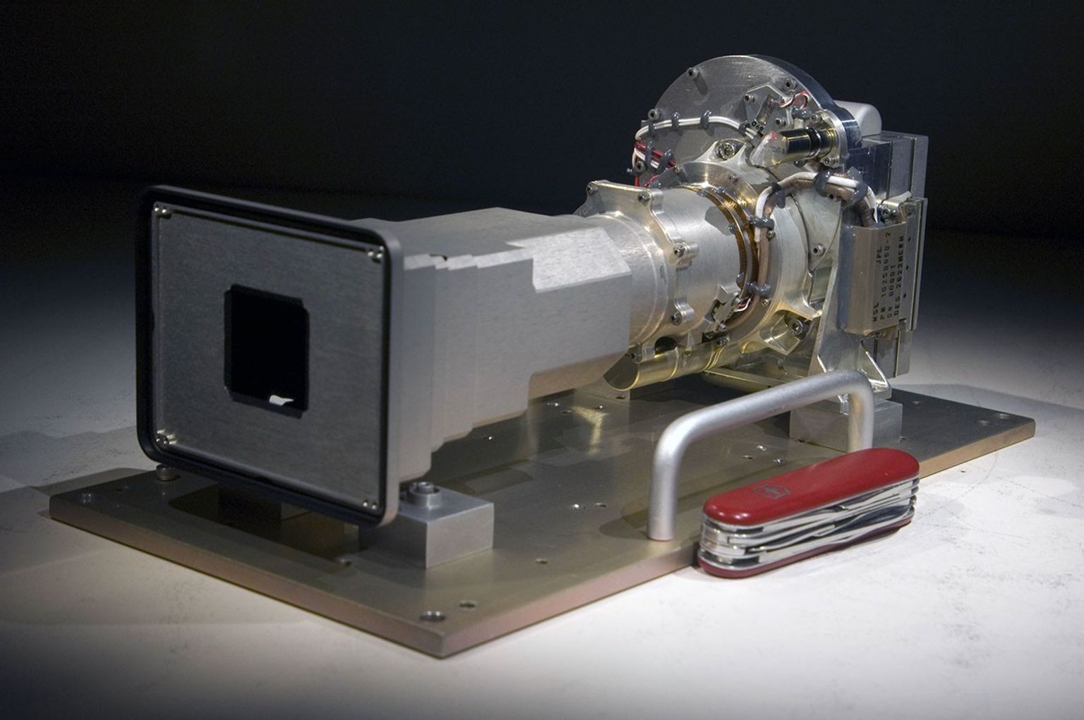 The Mast Camera (Mastcam) instrument for NASA's Mars Science Laboratory will use a side-by side pair of cameras for examining terrain around the mission's rover, Curiosity. The Mastcam 100 offers telephoto capability.