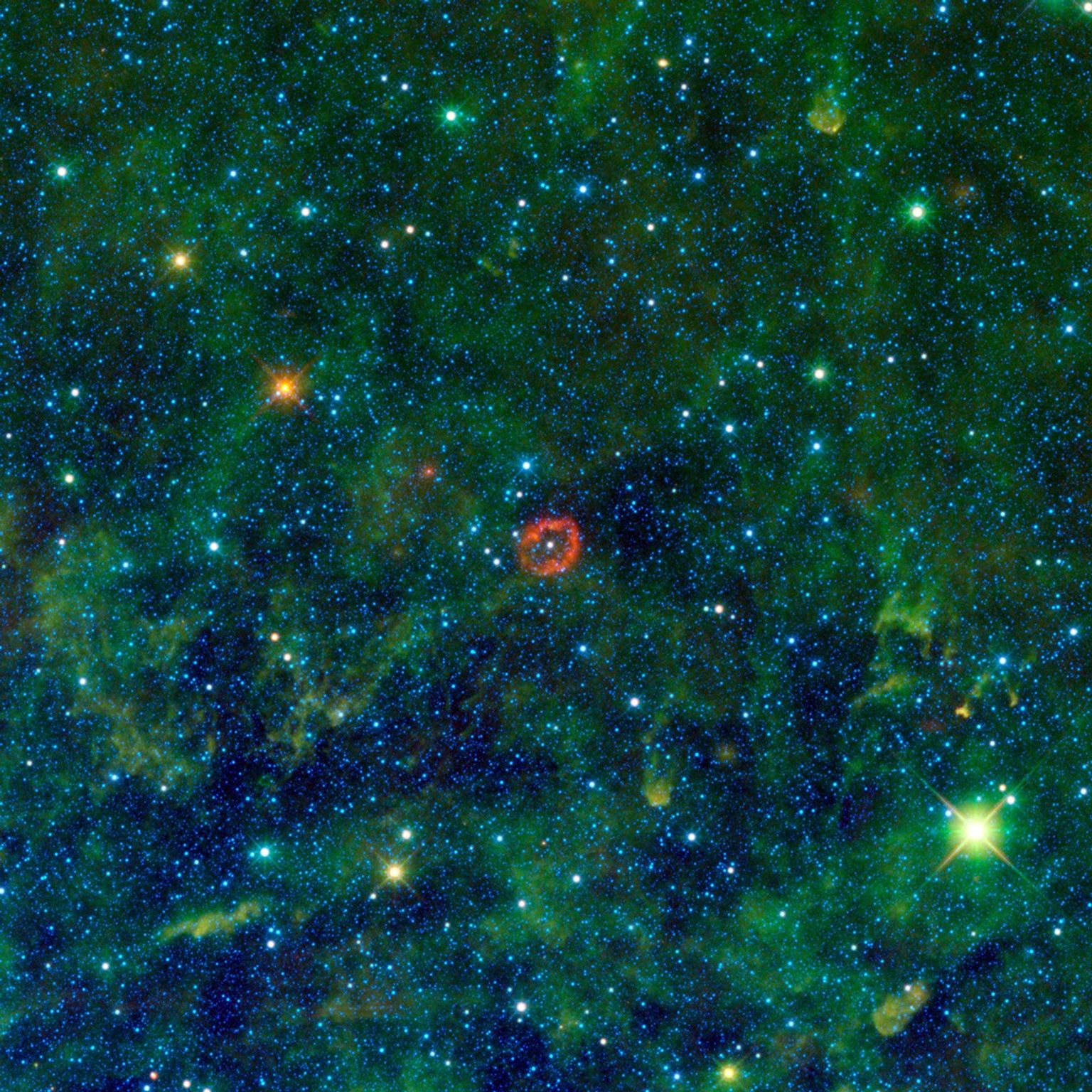Some might see a blood-red jellyfish, while others might see a pair of lips. In fact, the red-colored object in this new image from NASA's Wide-field Infrared Survey Explorer is a sphere of stellar innards.