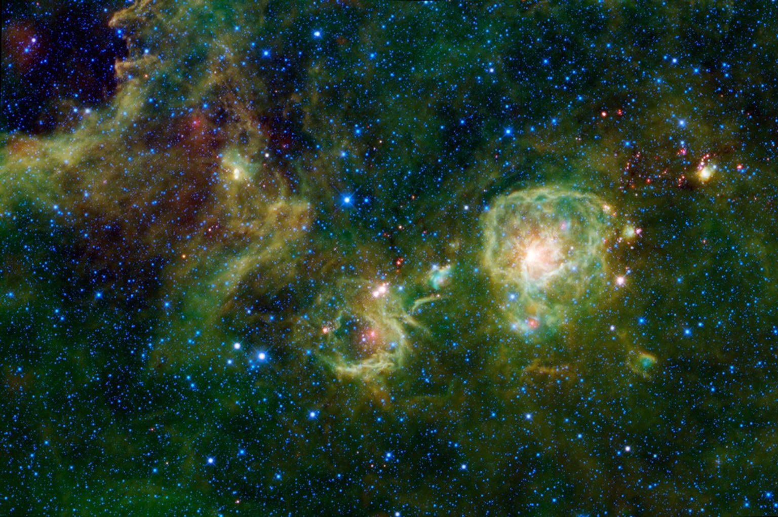 New stars are forming inside this giant cloud of dust and gas as seen in infrared light by NASA's Wide-field Infrared Survey Explorer, spanning across the constellation Vela.
