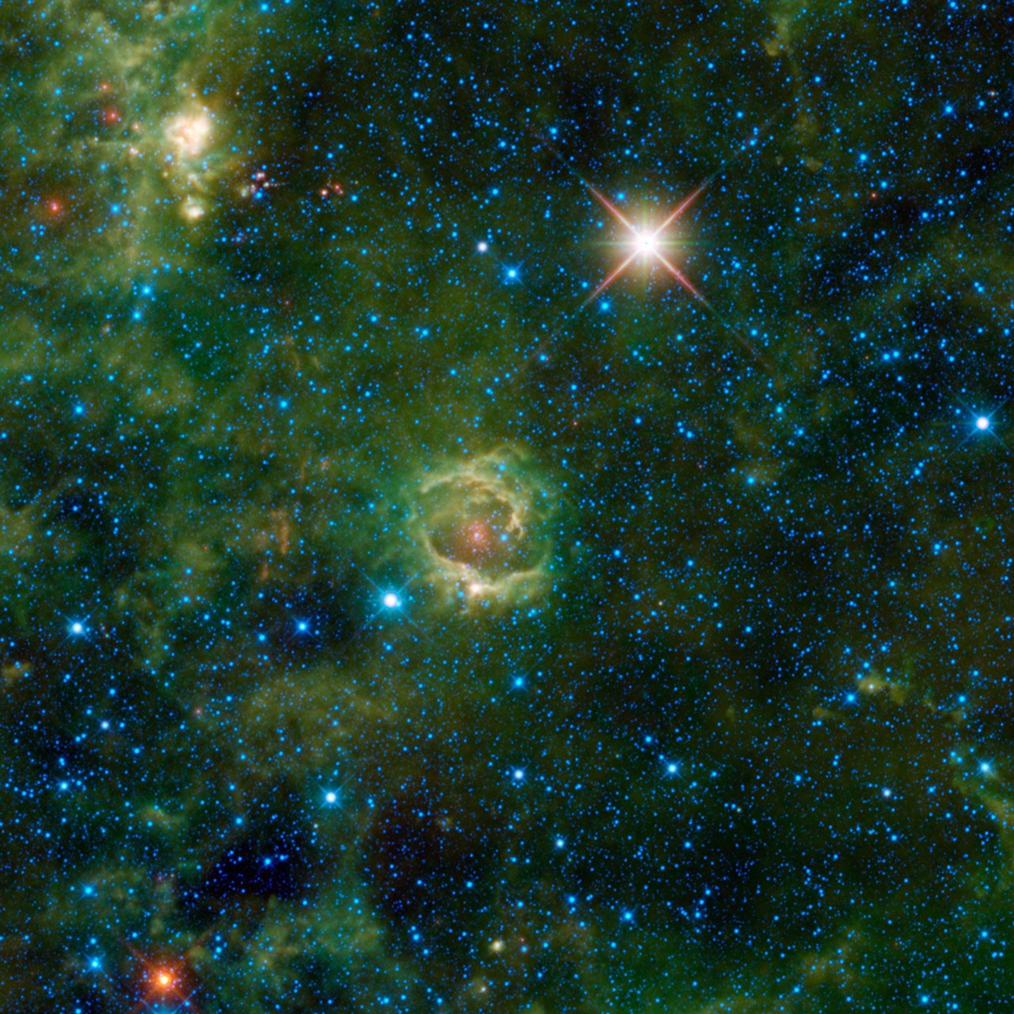 Nebulae are enormous clouds of dust and gas occupying the space between the stars. Simply called LBN 114.55+00.22, is seen here in an image from NASA's Wide-field Infrared Survey Explorer.