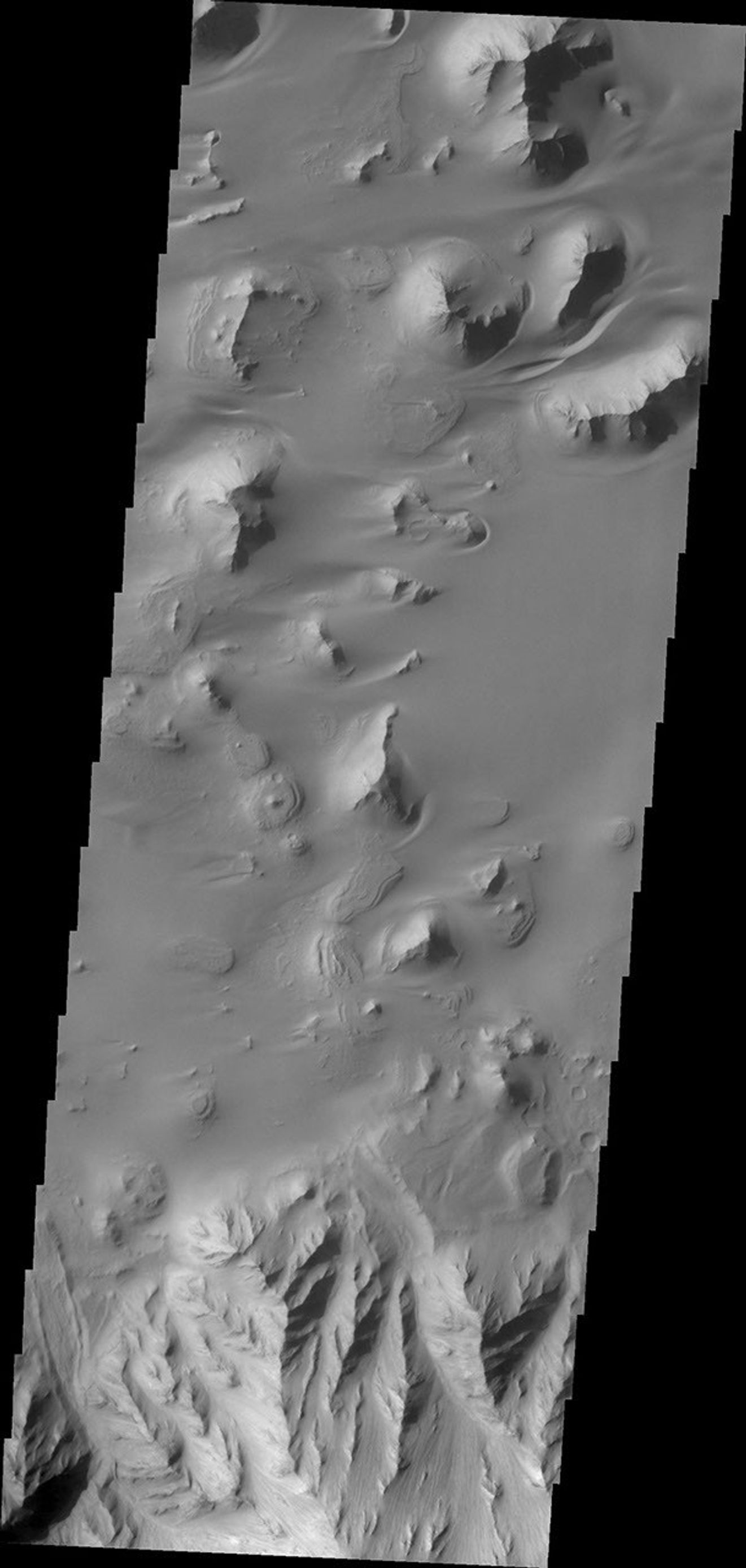 Sand is abundant of this portion of the floor of Ganges Chasma as captured by NASA's 2001 Mars Odyssey.