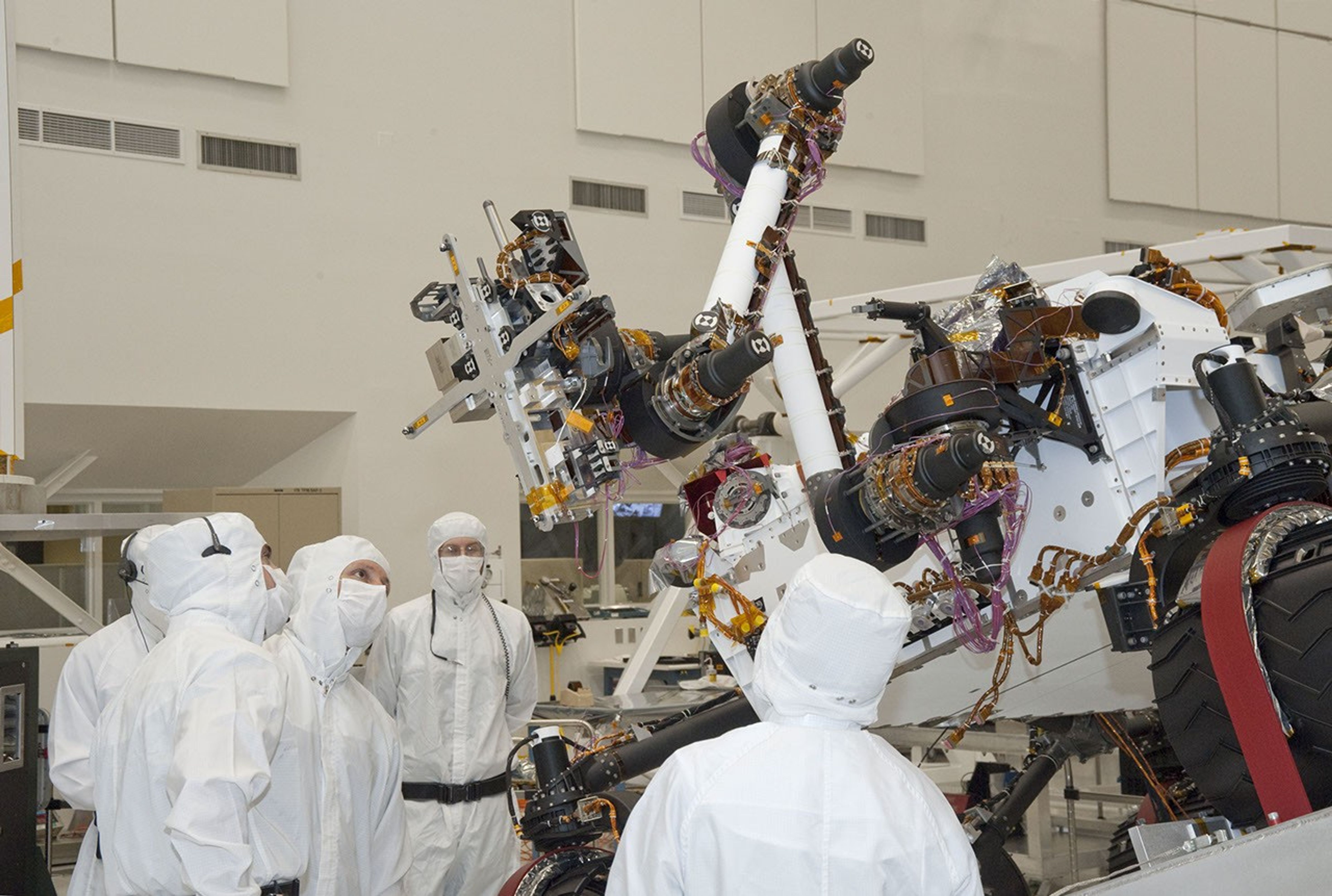 Testing of the robotic arm on NASA's Mars rover Curiosity on Sept. 3, 2010, included movements of the arm while the rover was on a table tilted to 20 degrees to simulate a sloped surface on Mars.