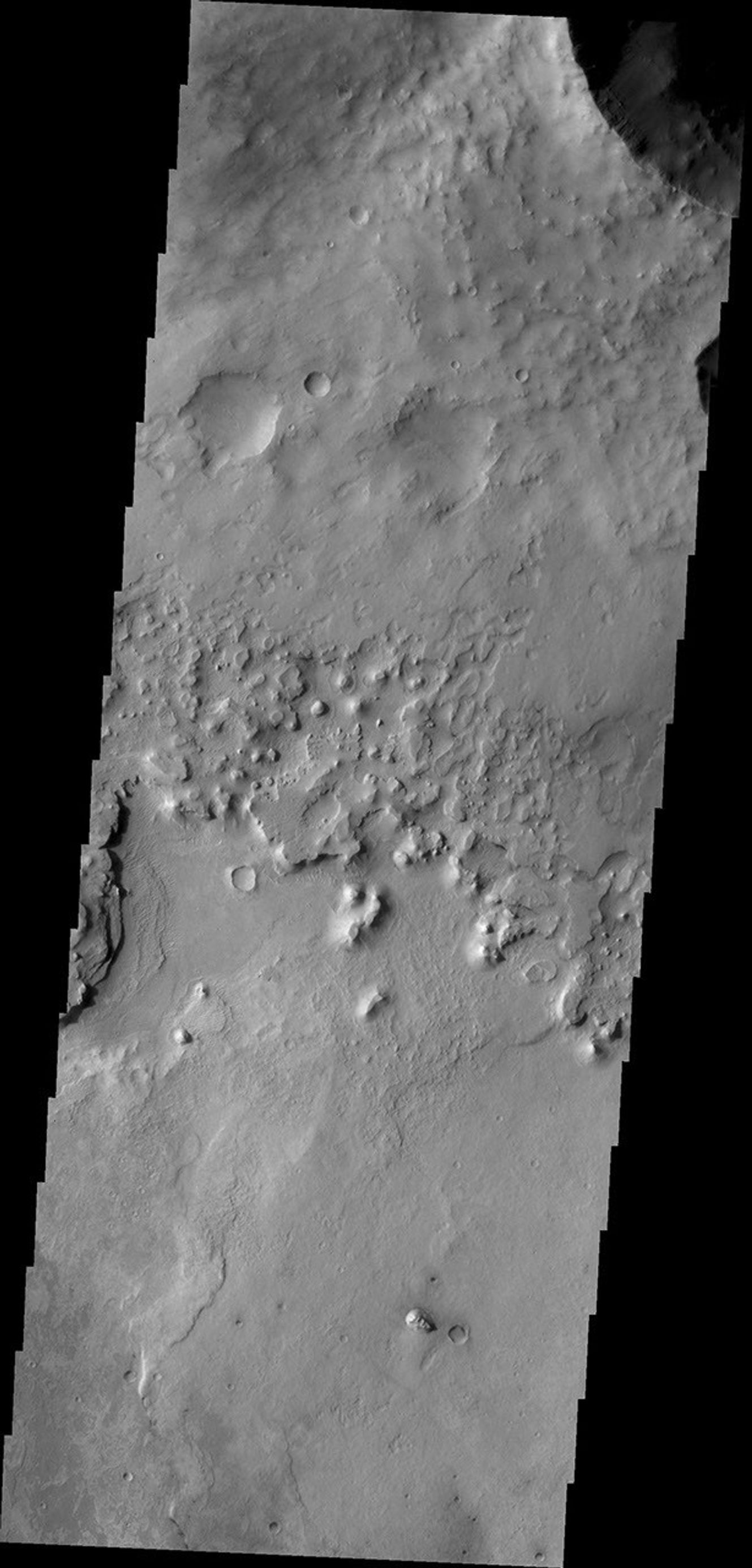 The ejecta blanket created around impact craters is often much more resistant to erosion than surrounding surface materials. As seen by NASA's Mars Odyssey, the ejecta material creates isolated highs as surrounding surface is eroded near Meridiani Planum.