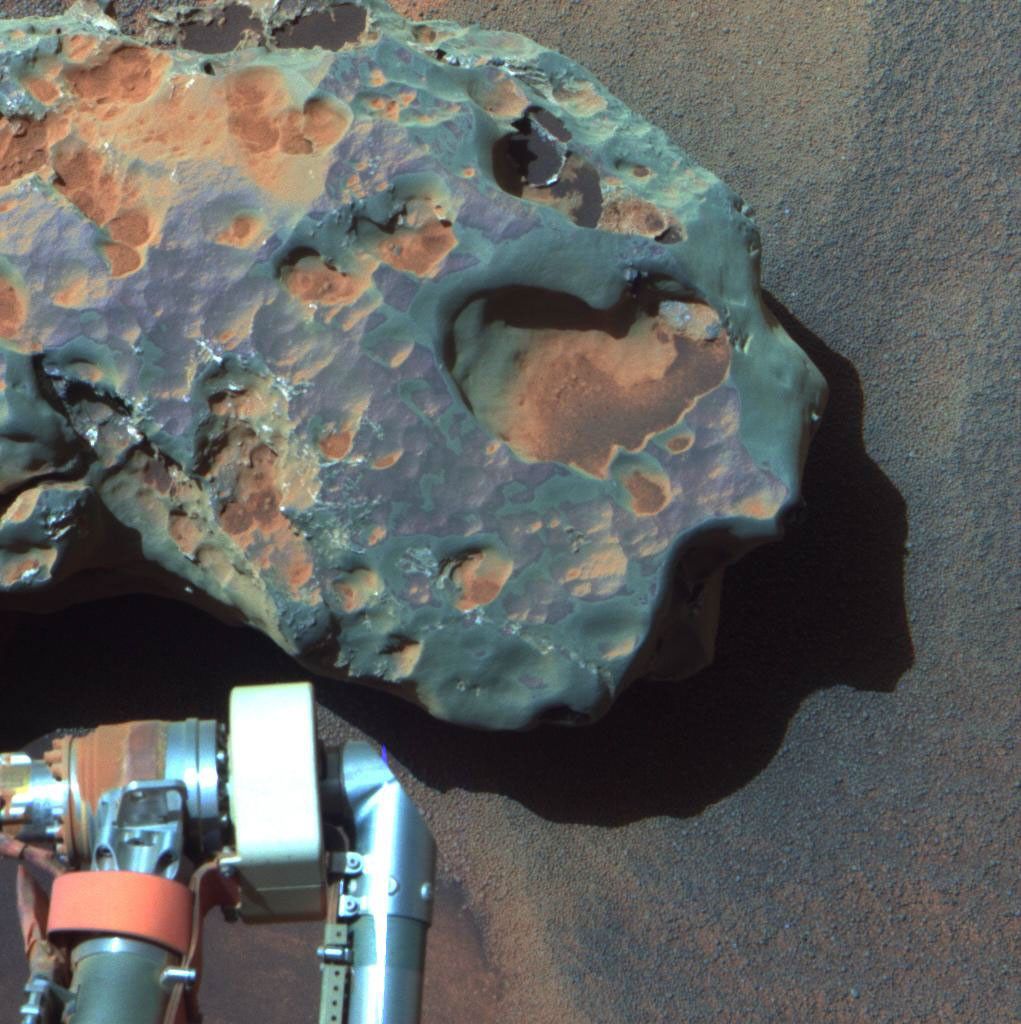 NASA's Mars Exploration Rover Opportunity found this image of a meteorite. The science team used two tools on Opportunity's arm, the microscopic imager and the alpha particle X-ray spectrometer, to inspect the rock's texture and composition.