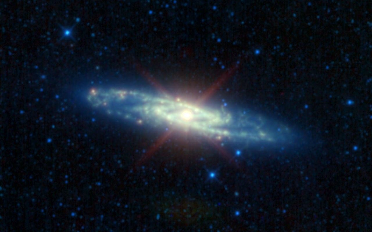 The Many Infrared 'Personalities' of the Sculptor Galaxy - NASA