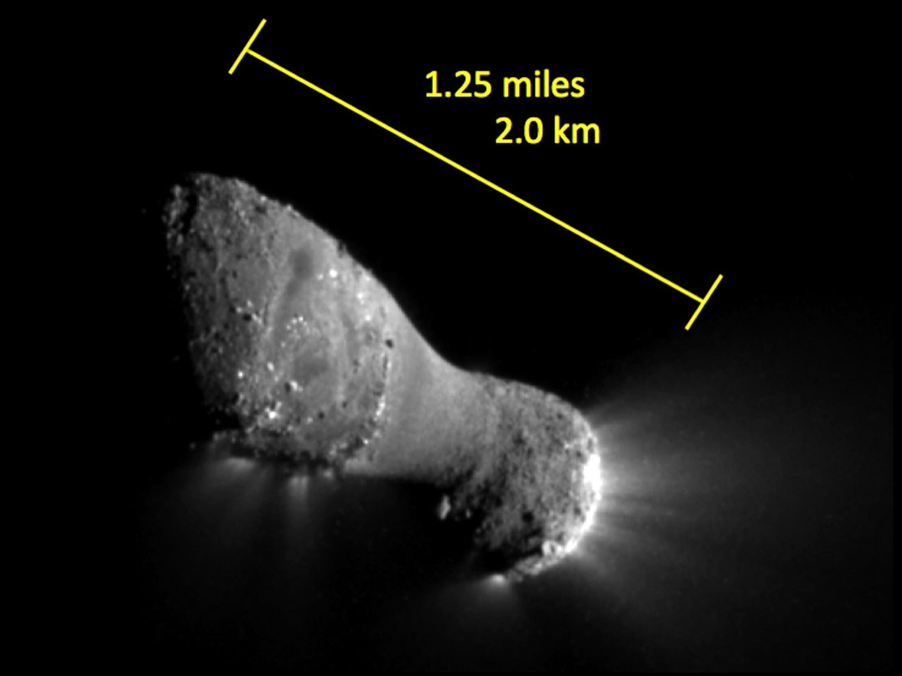 This image, one of the closest taken of comet Hartley 2 by NASA's EPOXI mission, shows many features across the comet's surface. The length of the comet is equal to the distance between the Capitol building and the Washington Monument in Washington.