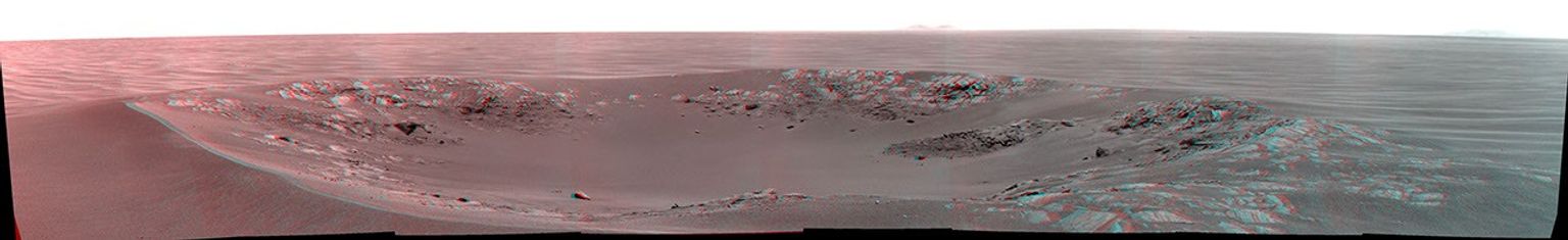 'Intrepid' crater on Mars carries the name of the lunar module of NASA's Apollo 12 mission, which landed on Earth's moon Nov. 19, 1969. NASA's Mars Exploration Rover Opportunity recorded this stereo view on Nov. 11, 2010. 3D glasses are necessary.