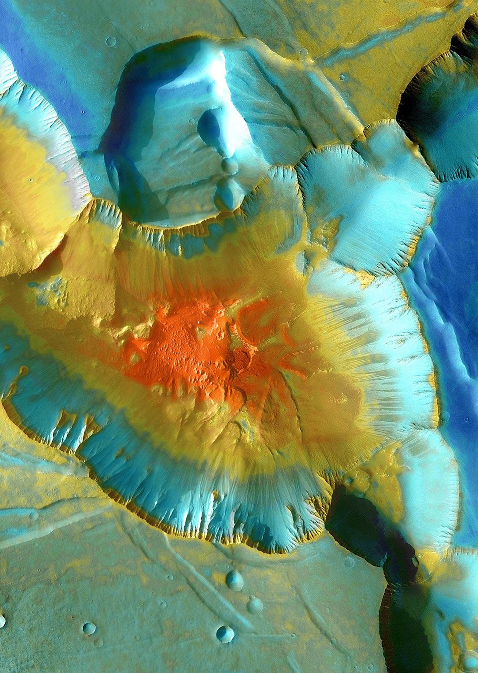 This false-color mosaic focuses on one junction in Noctis Labyrinthus where canyons meet to form a depression 4,000 meters (13,000 feet) deep. This image is from NASA's Mars Odyssey, one of an 'All Star' set.