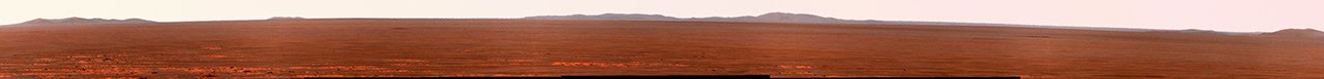 On Nov. 18, 2010, NASA's Mars Exploration Rover Opportunity took this false-color image showing portions of the rim of Endeavour Crater on Mars.