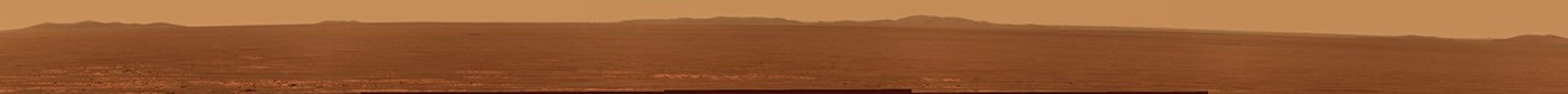 On Nov. 18, 2010, NASA's Mars Exploration Rover Opportunity took this true-color image showing portions of the rim of Endeavour Crater on Mars.