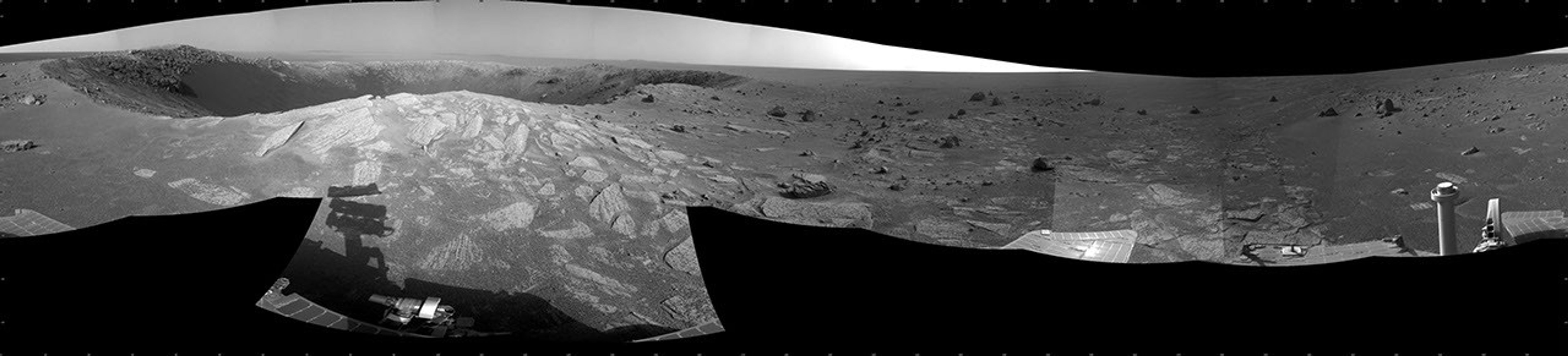 A football-field-size crater, informally named 'Santa Maria,' dominates the scene in this 360-degree view from NASA's Mars Exploration Rover Opportunity.