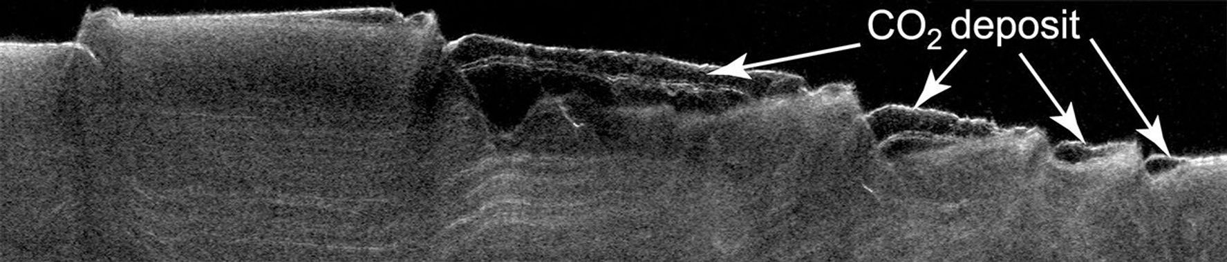 This cross-section view of underground layers near Mars' south pole is a radargram based on data from the Shallow Subsurface Radar (SHARAD) instrument on NASA's Mars Reconnaissance Orbiter.