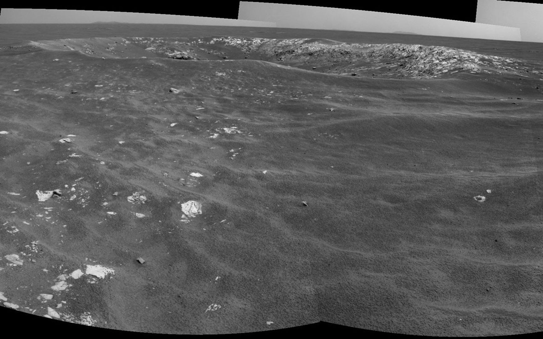 NASA's Mars Exploration Rover Opportunity recorded this view of a crater informally named 'Freedom 7' shortly before the 50th anniversary of the first American in space: astronaut Alan Shepard's flight in the Freedom 7 spacecraft.