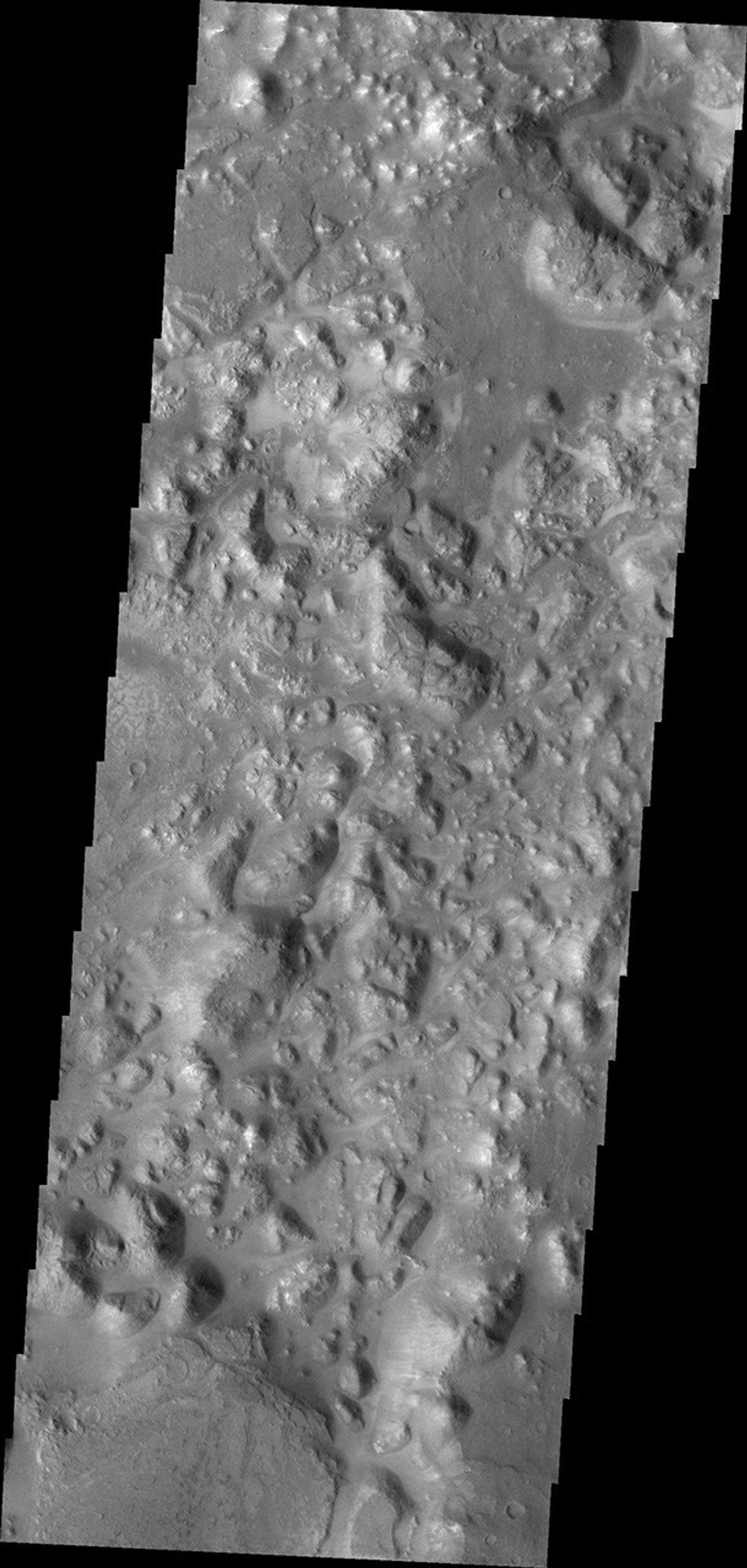 Areas of blocky terrain are common in Morava Valles. The blocks are termed chaos and are near the beginning of the valley system as seen in this image from NASA's Mars Odyssey.